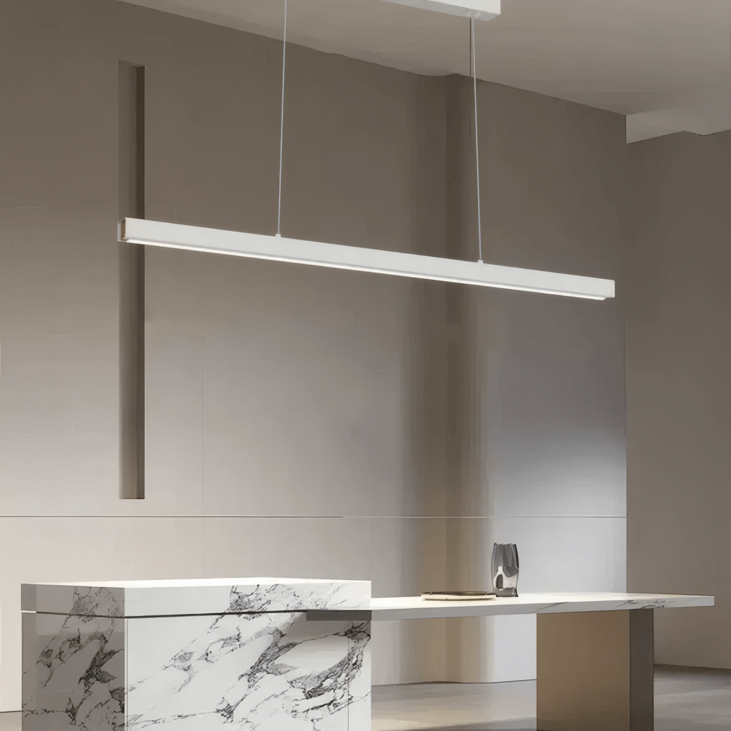 Modern White Linear Pendant Light Above Marble Console