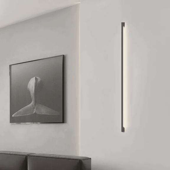 Modern Wall Lamp beside Artwork in Minimalist Living Room