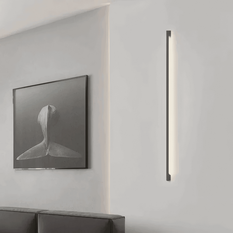 Modern Wall Lamp beside Artwork in Minimalist Living Room