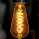 A vintage light bulb showcasing LED lighting savings in comparison to traditional bulbs.