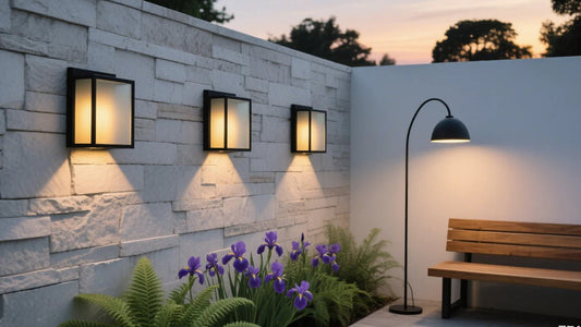 Stylish garden featuring durable affordable LED outdoor lights on a stone wall with purple flowers and a wooden bench.