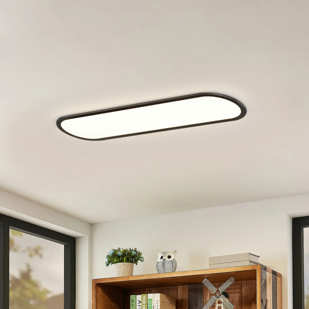 Minimalist Black Oval -shaped Ceiling Light for Bedroom