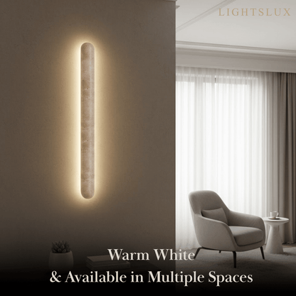 Travertine Pillar Wall Lamp — Slender Carved Stone with Back Glow