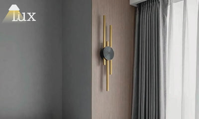 Lámpara de pared lineal moderna Arcato - Metal negro/dorado para sala de estar